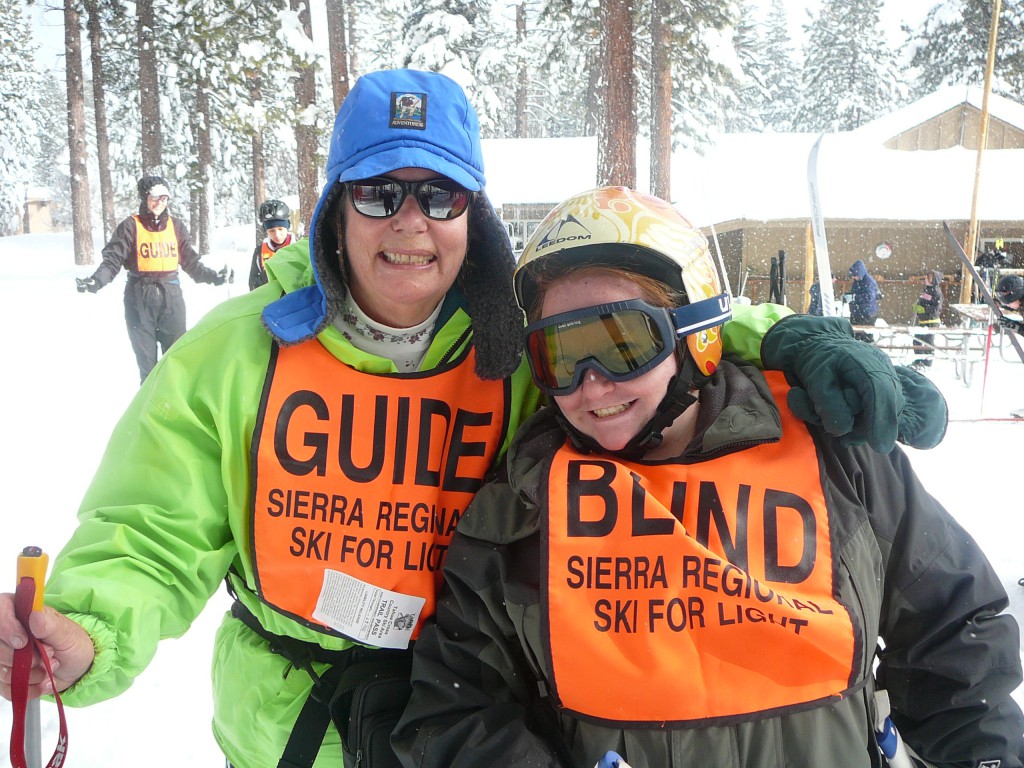 Skier Lacy Butler and Guide Edie Lott on a snowy day trip in 2010.